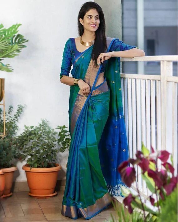 Green sari with a pink border