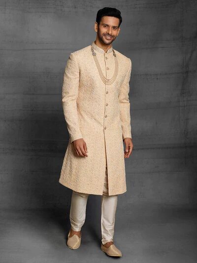 Cream sherwani with gold embroidery